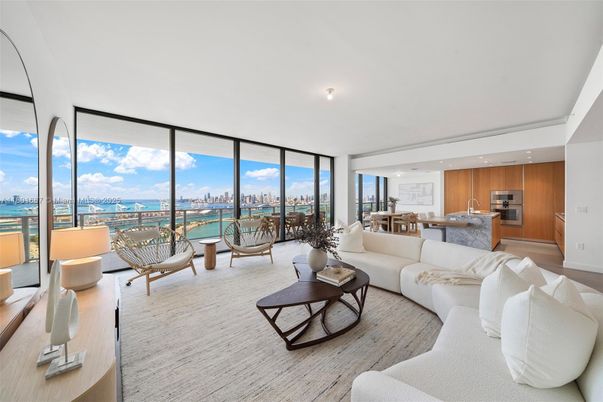 Dining room, Interior, Kitchen, Living room, Recessed Lighting, Stainless Steel Appliances, Water, Wood Texture Flooring