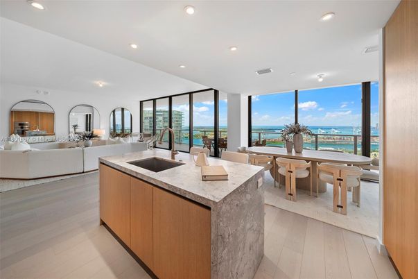 Dining room, Interior, Kitchen, Living room, Recessed Lighting, Water, Wood Texture Flooring