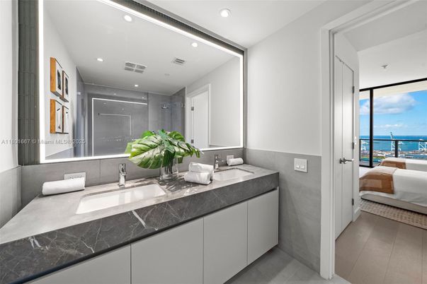 Bathroom, Bedroom, Dual Sink Vanities, Interior, Recessed Lighting, Water, Wood Texture Flooring