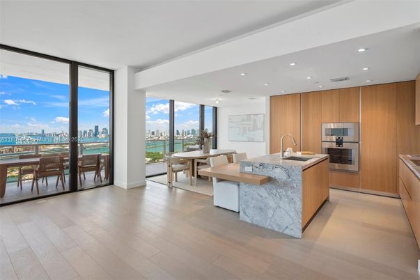 Dining room, Interior, Kitchen, Recessed Lighting, Stainless Steel Appliances, Water, Wood Texture Flooring