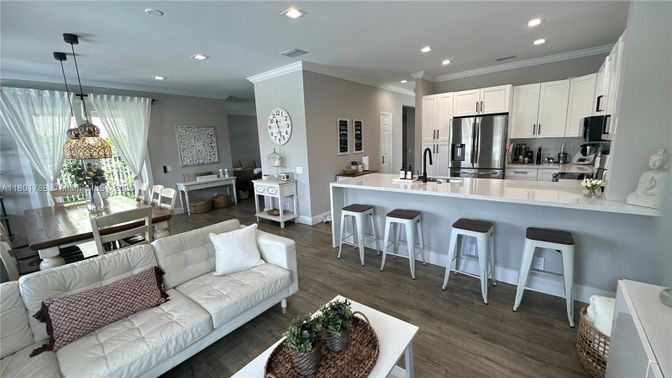 Dining room, Interior, Kitchen, Living room, Pendant Lights, Recessed Lighting, Stainless Steel Appliances, Wood Texture Flooring