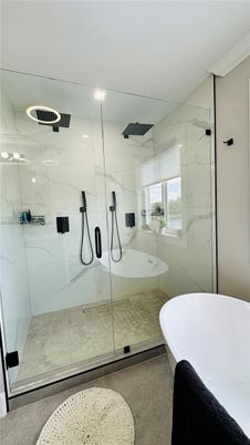 Bathroom, Free Standing Baths, Glass Shower, Interior, Marble Walls, Recessed Lighting