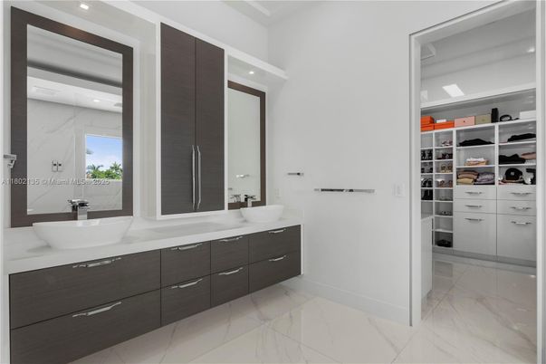 Bathroom, Dual Sink Vanities, Interior, Marble, Marble Walls, Recessed Lighting