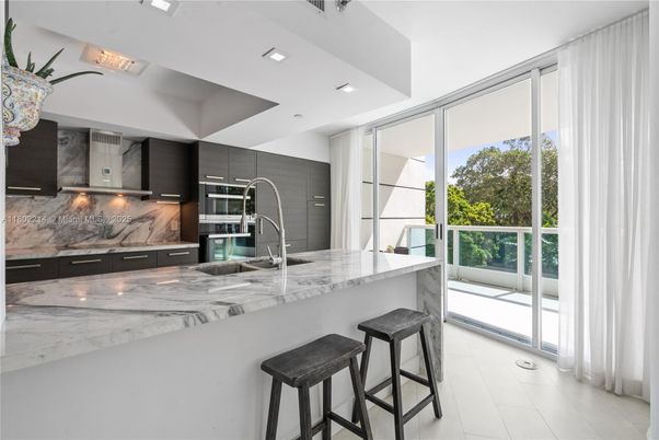 Interior, Kitchen, Marble Walls, Recessed Lighting, Stainless Steel Appliances