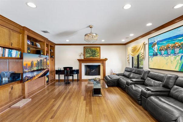 Chandelier, Fireplace, Interior, Living room, Recessed Lighting, Wood Texture Flooring