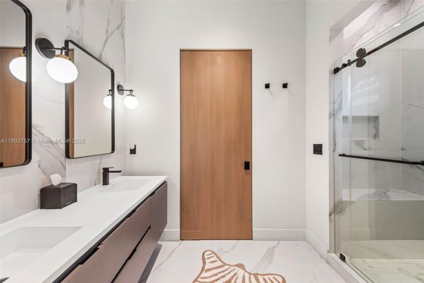 Bathroom, Dual Sink Vanities, Glass Shower, Interior, Marble, Marble Walls