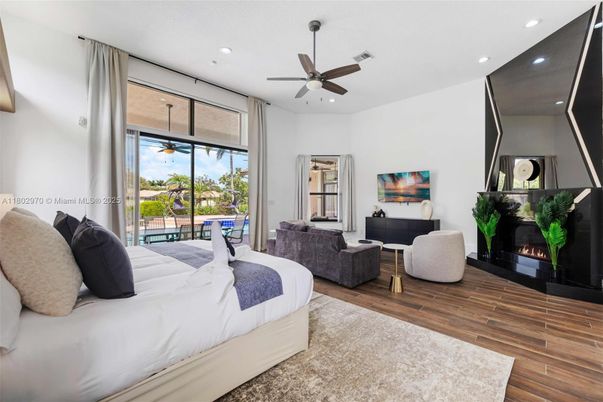 Bedroom, Fireplace, Interior, Living room, Recessed Lighting, Wood Texture Flooring