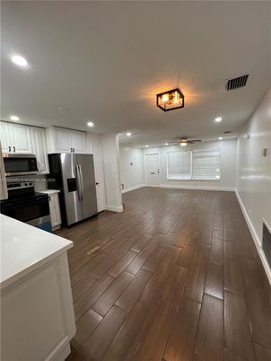 Interior, Kitchen, Recessed Lighting, Stainless Steel Appliances, Wood Texture Flooring