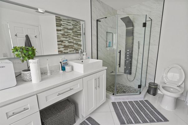 Bathroom, Dual Sink Vanities, Glass Shower, Interior, Marble Walls