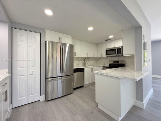 Interior, Kitchen, Recessed Lighting, Stainless Steel Appliances, Wood Texture Flooring
