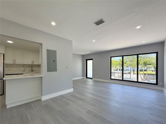 Empty room, Interior, Kitchen, Marble Walls, Recessed Lighting, Wood Texture Flooring