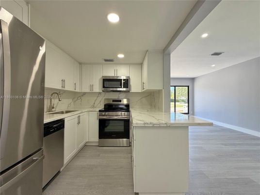 Interior, Kitchen, Recessed Lighting, Stainless Steel Appliances, Wood Texture Flooring