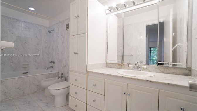 Bathroom, Dual Sink Vanities, Interior, Marble, Marble Walls, Recessed Lighting