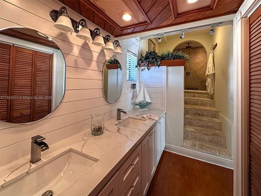 Bathroom, Dual Sink Vanities, Interior, Recessed Lighting, Wood Texture Flooring