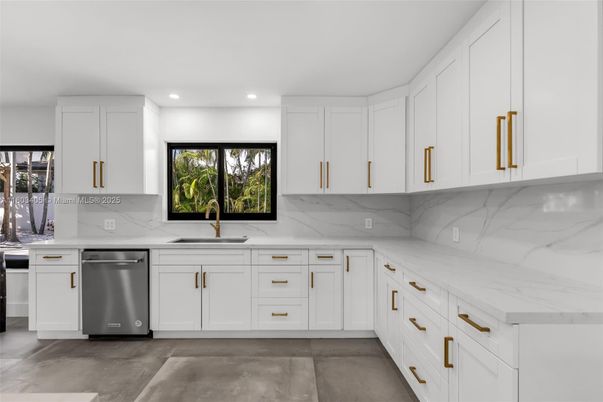 Interior, Kitchen, Marble Walls, Recessed Lighting, Stainless Steel Appliances