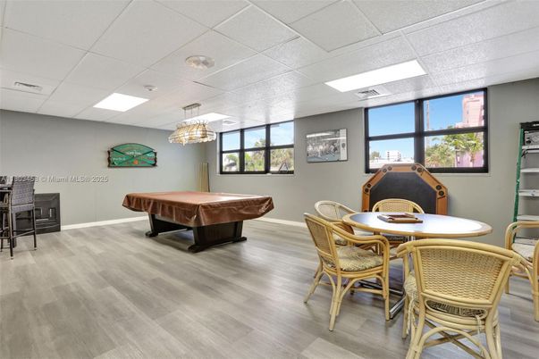 Billiard Table, Chandelier, Dining room, Game Room, Interior, Recessed Lighting, Wood Texture Flooring
