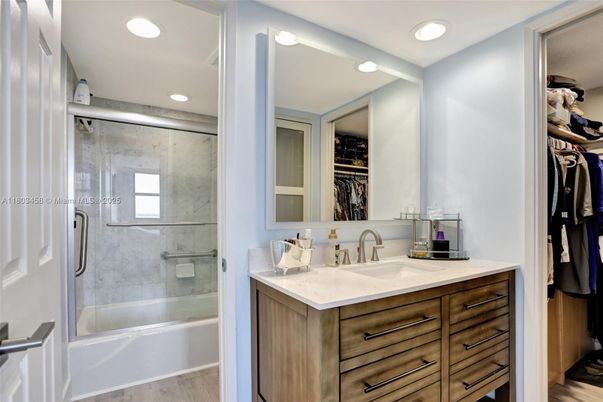 Bathroom, Glass Shower, Interior, Recessed Lighting, Walk-in Closets, Wood Texture Flooring
