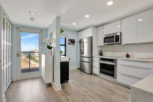 Interior, Kitchen, Recessed Lighting, Stainless Steel Appliances, Wood Texture Flooring