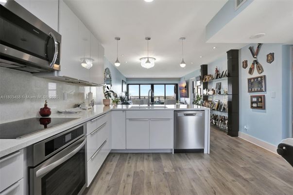 Interior, Kitchen, Pendant Lights, Recessed Lighting, Stainless Steel Appliances, Wood Texture Flooring