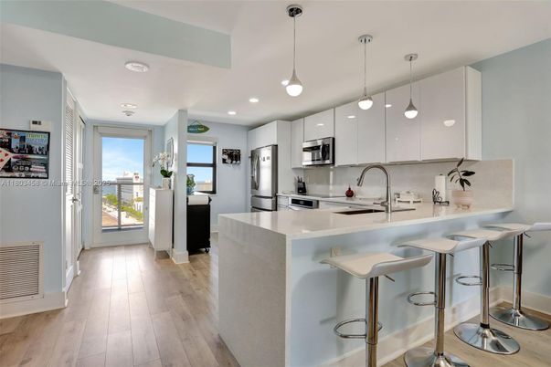 Interior, Kitchen, Pendant Lights, Recessed Lighting, Stainless Steel Appliances, Wood Texture Flooring
