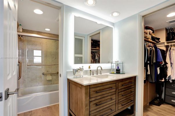 Bathroom, Glass Shower, Interior, Recessed Lighting, Walk-in Closets, Wood Texture Flooring