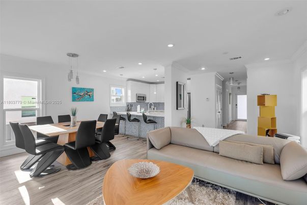 Dining room, Interior, Kitchen, Living room, Pendant Lights, Recessed Lighting, Stainless Steel Appliances, Wood Texture Flooring
