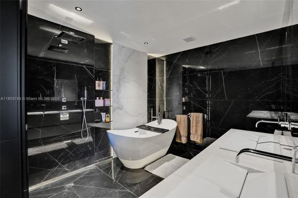 Bathroom, Dual Sink Vanities, Free Standing Baths, Interior, Marble, Marble Walls, Recessed Lighting