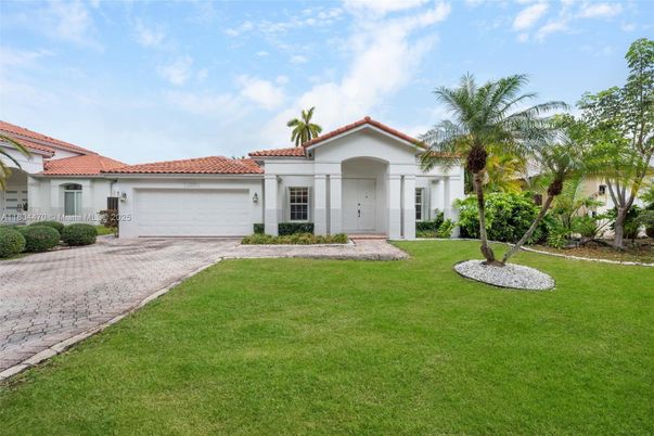 Attached, Backyard, Exterior, Facade, Spanish Mediterranean