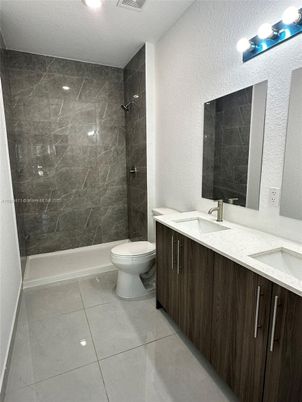 Bathroom, Dual Sink Vanities, Interior, Marble Walls, Recessed Lighting
