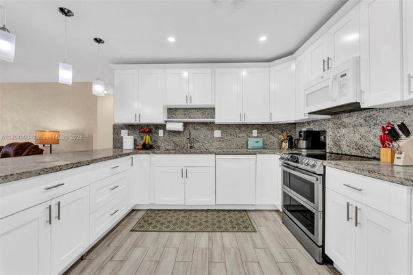 Interior, Kitchen, Pendant Lights, Recessed Lighting, Stainless Steel Appliances, Wood Texture Flooring