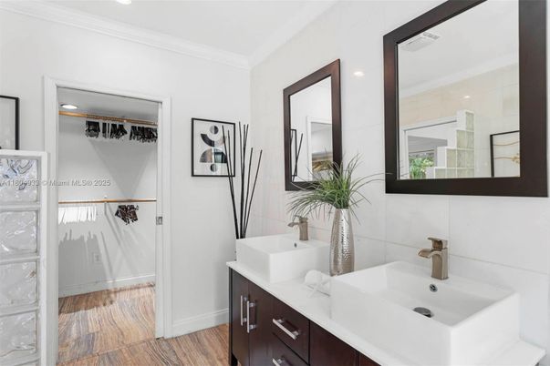Bathroom, Dual Sink Vanities, Interior, Recessed Lighting, Wood Texture Flooring