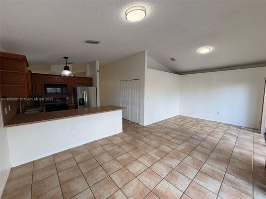 Empty room, Interior, Kitchen, Recessed Lighting, Stainless Steel Appliances