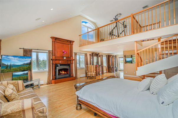 Bedroom, Fireplace, Interior, Recessed Lighting, Wood Texture Flooring