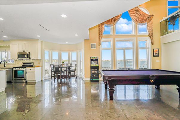 Billiard Table, Dining room, Game Room, Interior, Kitchen, Recessed Lighting, Stainless Steel Appliances, Water