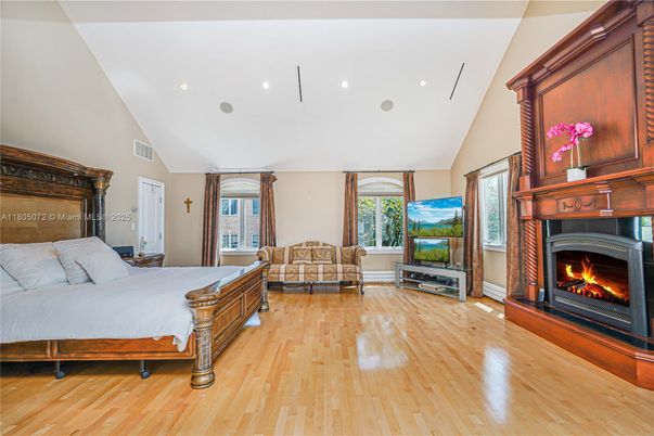 Bedroom, Fireplace, Interior, Recessed Lighting, Wood Texture Flooring