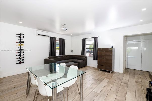 Dining room, Interior, Living room, Recessed Lighting, Wine Storage, Wood Texture Flooring