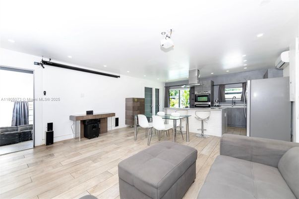 Dining room, Interior, Kitchen, Living room, Recessed Lighting, Stainless Steel Appliances, Wood Texture Flooring