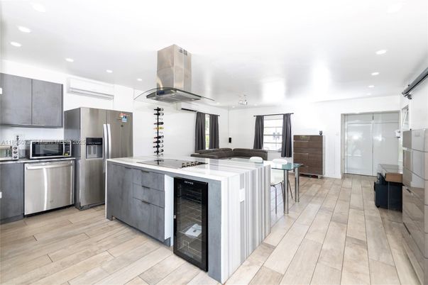 Dining room, Interior, Kitchen, Recessed Lighting, Stainless Steel Appliances, Wood Texture Flooring