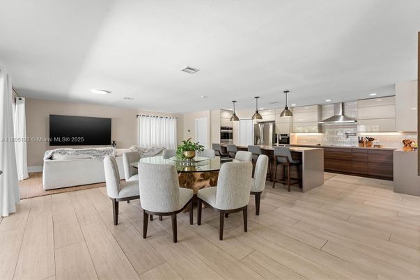 Dining room, Interior, Kitchen, Living room, Pendant Lights, Recessed Lighting, Stainless Steel Appliances, Wood Texture Flooring
