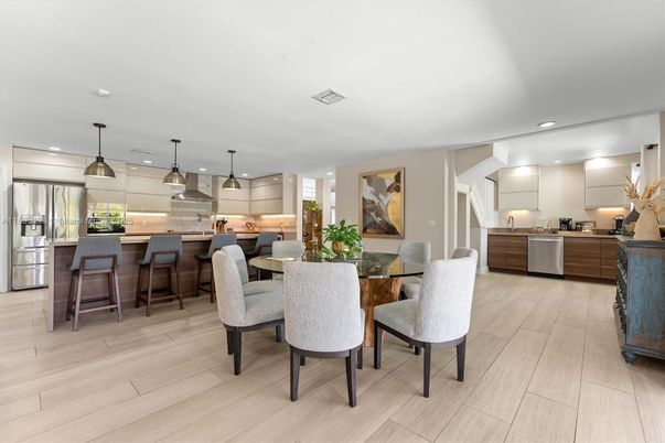 Dining room, Interior, Kitchen, Pendant Lights, Recessed Lighting, Stainless Steel Appliances, Wood Texture Flooring
