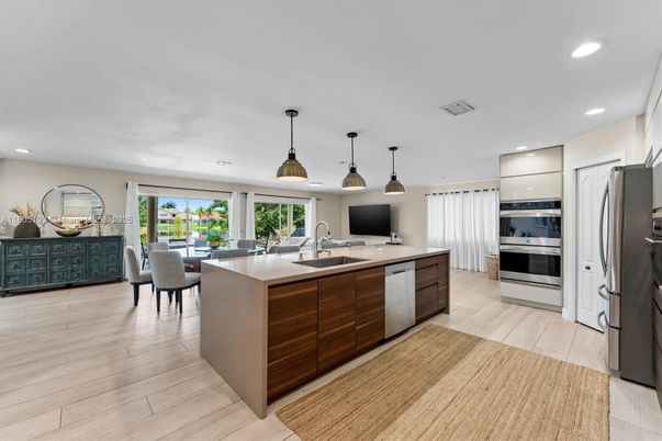 Dining room, Interior, Kitchen, Pendant Lights, Recessed Lighting, Stainless Steel Appliances, Wood Texture Flooring