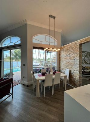Chandelier, Dining room, Interior, Pendant Lights, Stone Walls, Water, Wood Texture Flooring