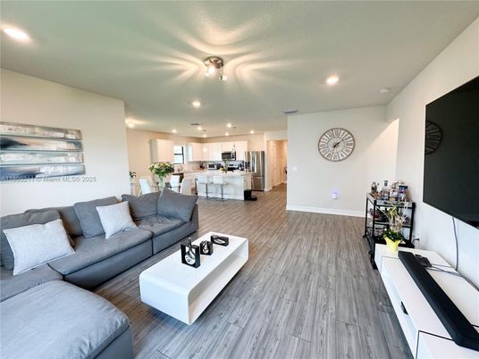 Dining room, Interior, Kitchen, Living room, Recessed Lighting, Stainless Steel Appliances, Wood Texture Flooring