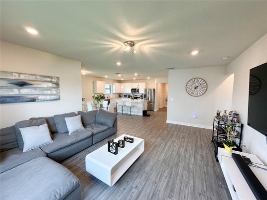 Dining room, Interior, Kitchen, Living room, Recessed Lighting, Stainless Steel Appliances, Wood Texture Flooring