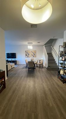 Dining room, Interior, Living room, Pendant Lights, Wood Texture Flooring