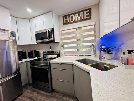 Interior, Kitchen, Recessed Lighting, Stainless Steel Appliances, Wood Texture Flooring