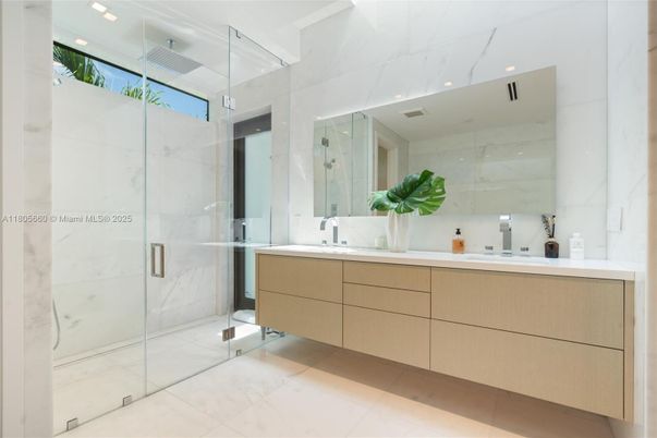 Bathroom, Dual Sink Vanities, Glass Shower, Interior, Marble Walls, Recessed Lighting