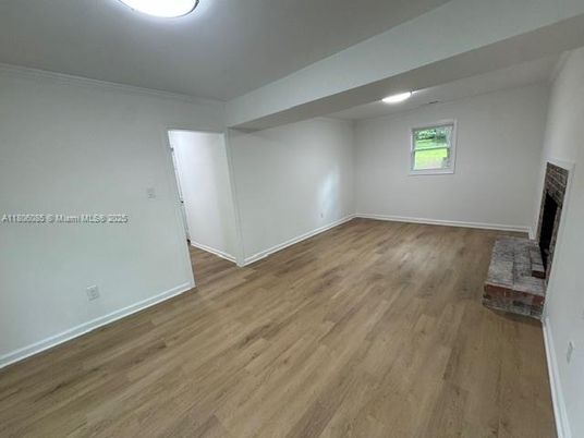 Empty room, Fireplace, Interior, Recessed Lighting, Wood Texture Flooring