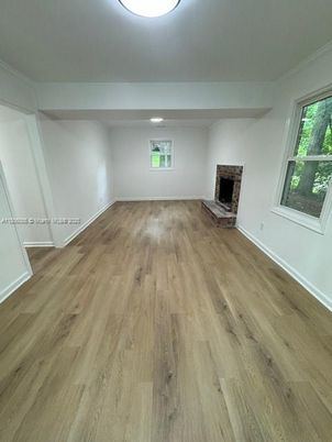 Empty room, Fireplace, Interior, Recessed Lighting, Wood Texture Flooring