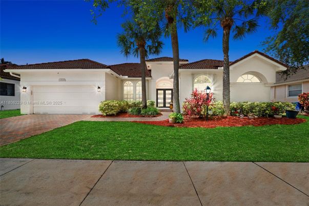Attached, Exterior, Facade, Spanish Mediterranean